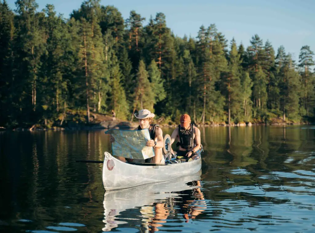 Two friends in a canoe IN Sweden