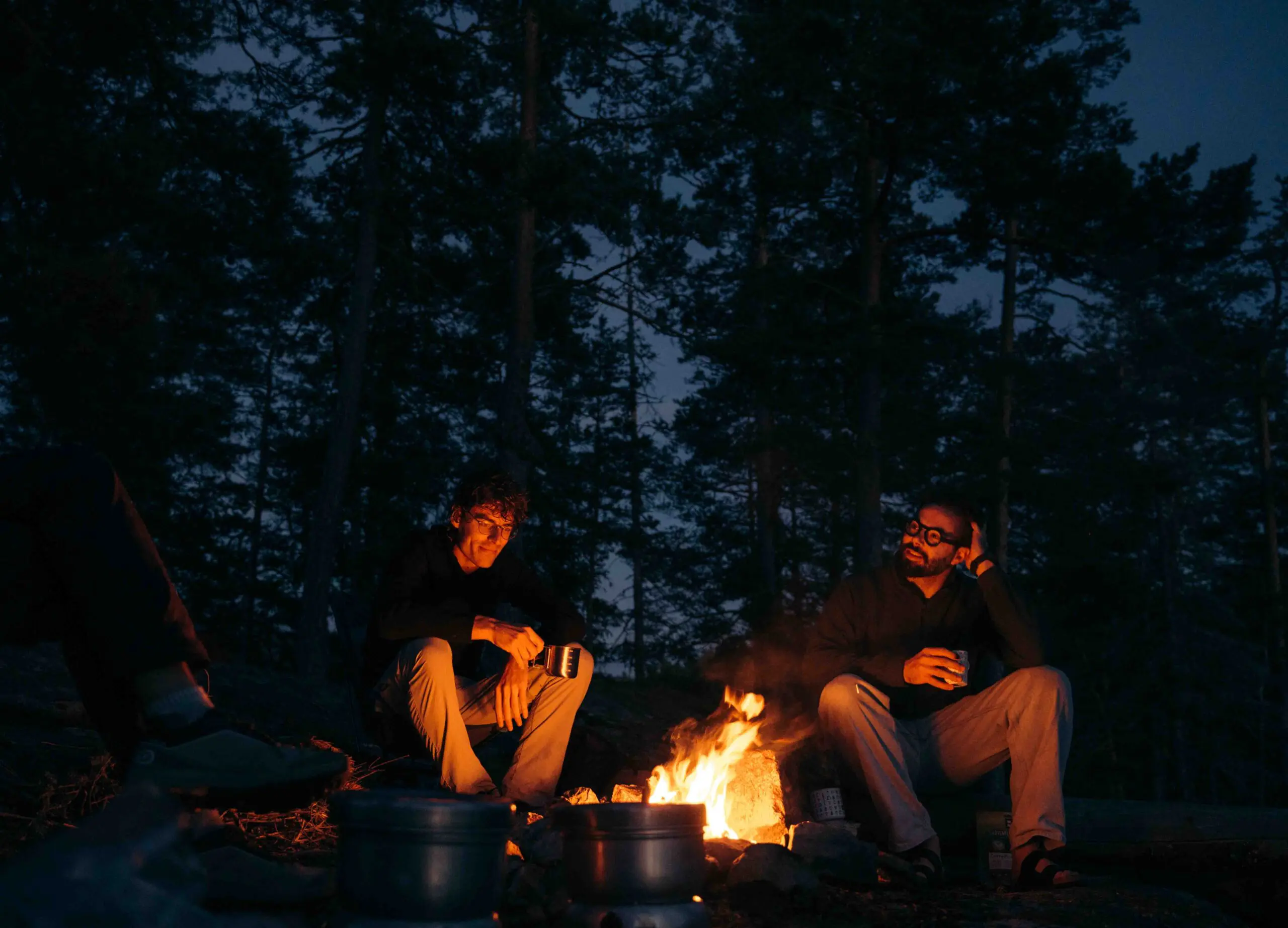 Two friends and a campfire